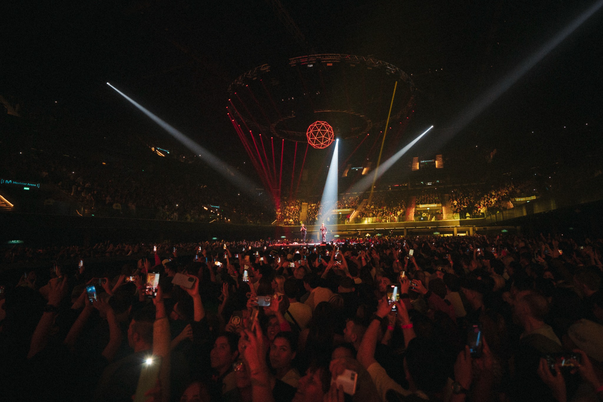 Crowd and performers at Movistar Arena during a Ke Personajes show